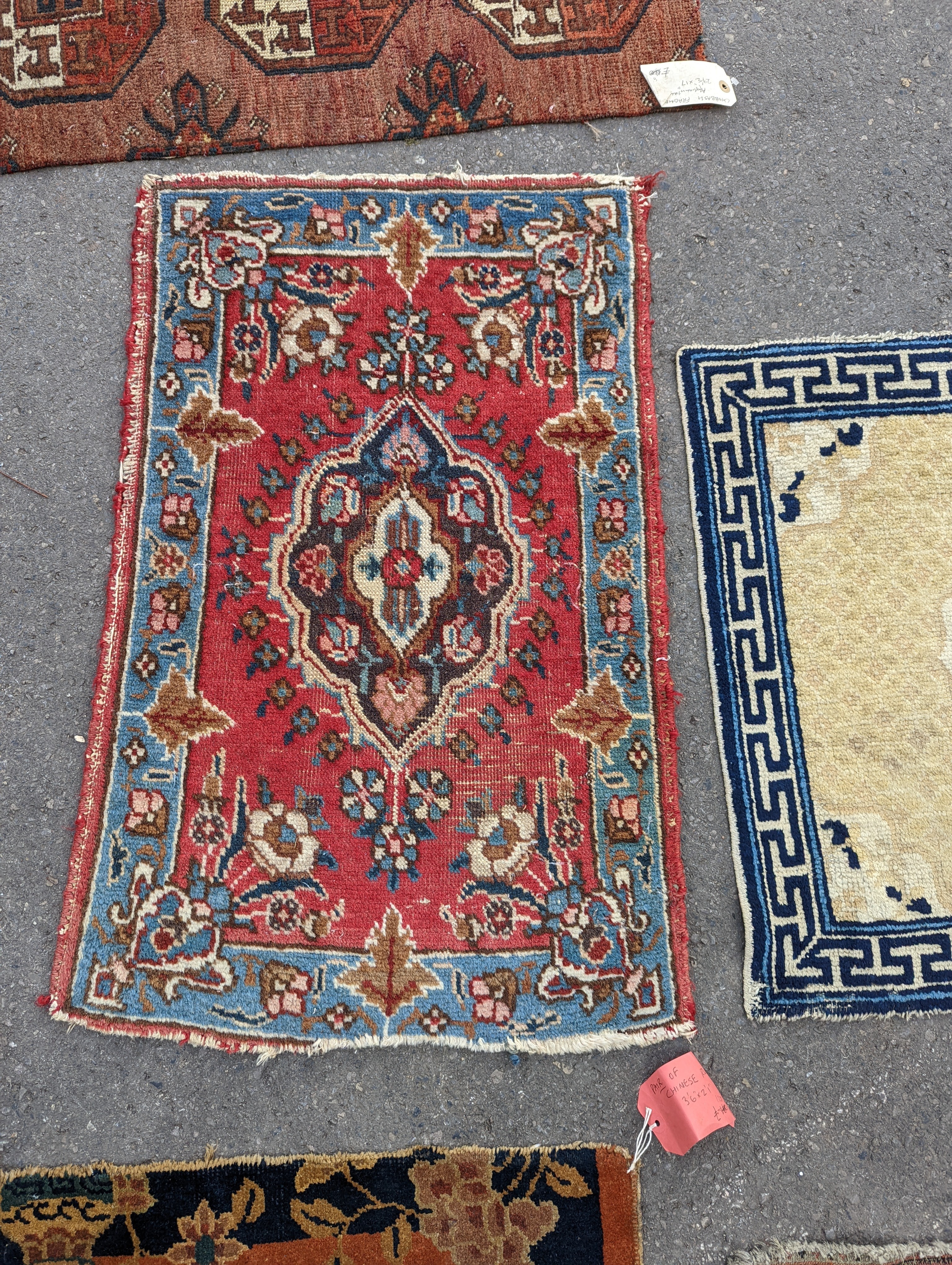 Nine Afghan, Persian and Chinese rug fragments.